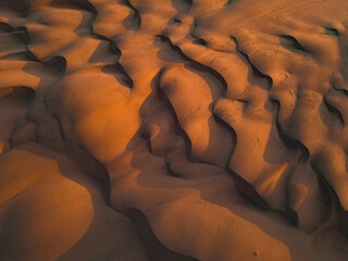 Fototapeta na wymiar Close up of pattern on sand dunes