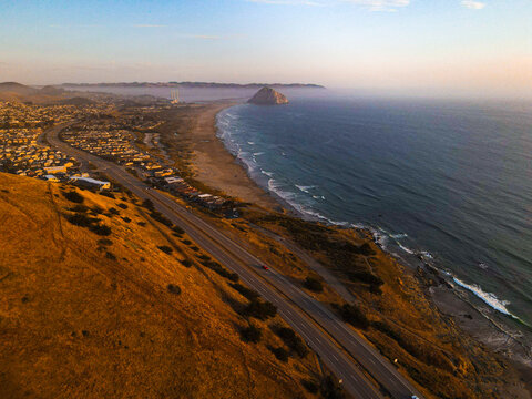 Aerial view of coastal road during sunset