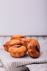 Basic muffin recipe. Banana strawberry oatmeal chip baked muffin cake on white background.