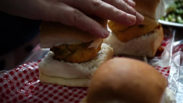 Selective focus macro shot of vada pav a fried potato in small buns a popular street food snack in mumbai India