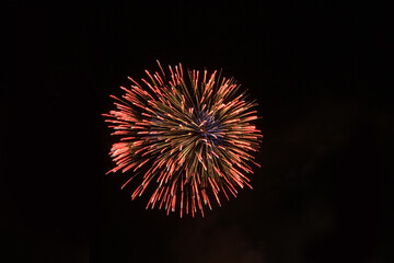 Fototapeta premium Beautiful Amazing fireworks with space isolated on a black background.