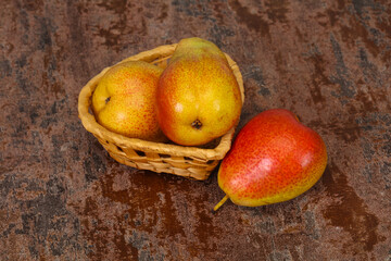 Pear heap in the wooden basket