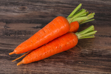 Three Young fresh ripe carrot
