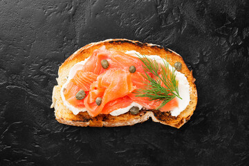 Sandwich with smoked and salted salmon for healthy breakfast 