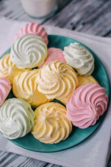 Colorful air marshmallows on a plate. Fresh homemade sweet marshmallows