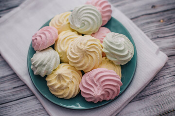 Colorful air marshmallows on a plate. Fresh homemade sweet marshmallows