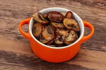 Roasted champignon with herbs and spices