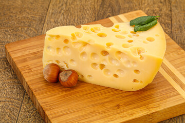 Maasdam cheese - yellow triangle with holes