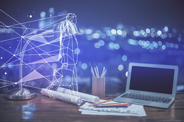 Desktop computer background in office and start up theme hologram drawing. Double exposure. Startup concept.