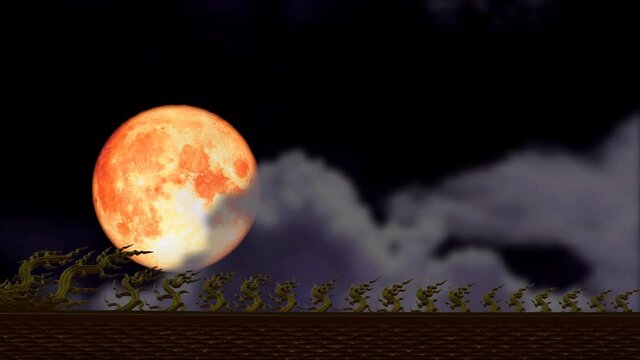 full Strawberry blood moon back on night sky and blur cloud moving pass on the roof