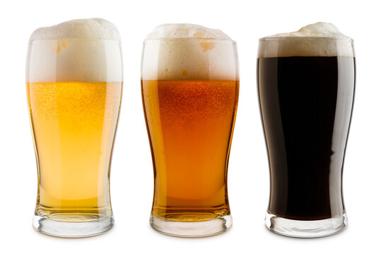 variety of beer glasses with foam, isolated on white background