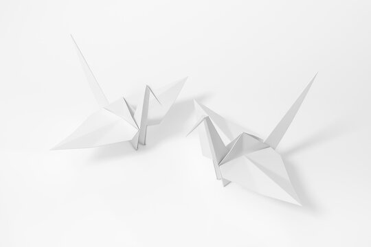Origami Bird, bird paper crane on white background 3d rendering. 3d illustration pair of bird paper craft for Hiroshima remembrance day minimal style concept.