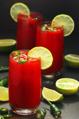 Jalapeno tomato margarita cocktail with lime	