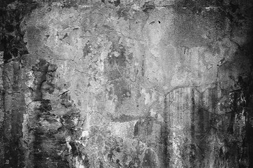 Fototapeta premium Black and white texture of an old cracked wall. Backgrounds.