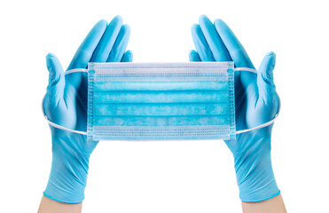 Doctor's hand in medical gloves wearing a mask isolated on white