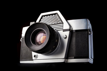 Old vintage photo SLR camera isolated black