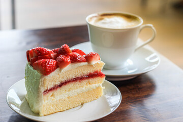 Take a break with   strawberry cheesecake and hot chocolate in coffee shop