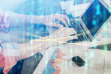 Multi exposure of technology hologram with man working on computer background. Concept of big data.