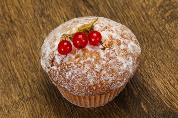 Sweet tasty muffin with red currants