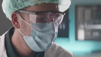 Scientist or a doctor researching 5G network affect on human body. We see a 5G sign and human body xray reflection in protective glasses. - Powered by Adobe