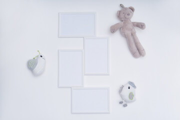 White mock up frame and toys on white background Child concept Copy sapce
