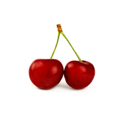 Close up red ripe sweet cherry isolated on white