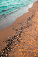 Water waves and sand on the beach,abstract bright colorful background