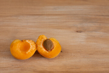 apricot berries on wooden background
