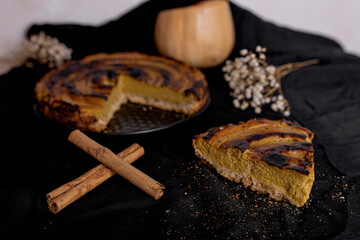 Healthy pumpkin pie with black background