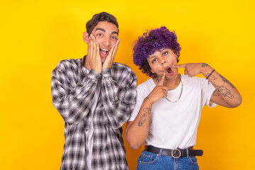 comic young couple isolated on background