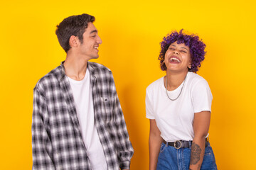 couple of young man and woman smiling happy isolated