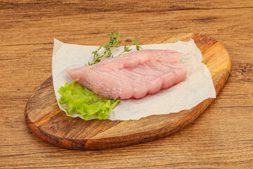 Raw turkey breast steak for cooking