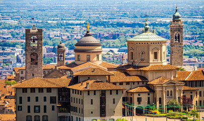 Bergamo, Italy , 09/05/2019, High angle view of the churches and main buildings of Bergamo Alta, historic district of Bergamo