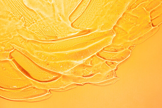 Cream gel yellow transparent cosmetic sample background
