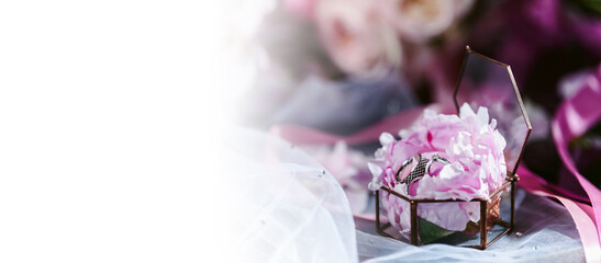 Elegant wedding accessories of an attractive bride. Wedding rings, shoes, bridal bouquet, floral...