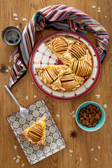 Typically french Bourdaloue pie on a wooden table