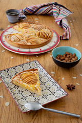 Typically french Bourdaloue pie on a wooden table