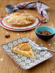 Typically french Bourdaloue pie on a wooden table