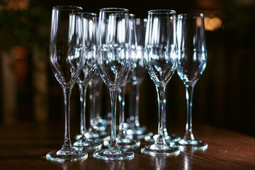Set or row glasses of wine on the table before reception or wedding party