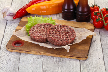 Raw burger cutlet