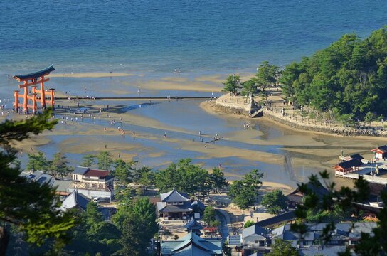 Aerial view towards famous Itsukushima Floating Torii Gate at  Miyajima island, Japan