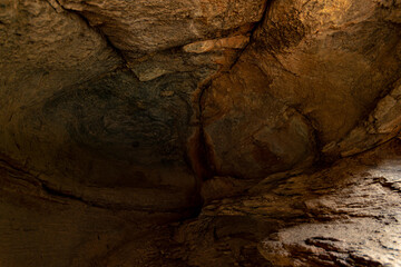 natural cave made by the erosion of wind and water naturally