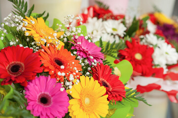 Bright multicolored bouquet of gerberas. Flower business. Selective focus.