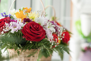 Colorful flower bouquet on the shelf. Flower business. Multi-colored bouquet. Selective focus. Macro photo.