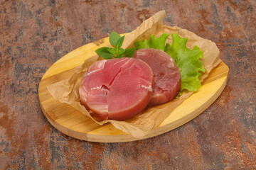 Raw tuna round steak for grill