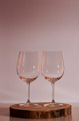 Two glasses of wine on white background,