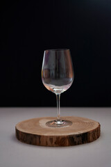 Glass of wine on black background