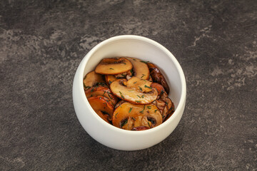 Roasted champignon with herbs and spices