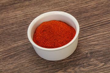 Dry paprika powder in the bowl