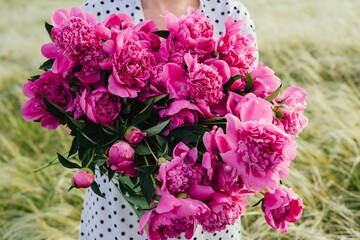 A huge bouquet of pink peonies.